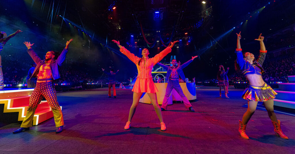 Madison and other Ringling performers perform on the stage