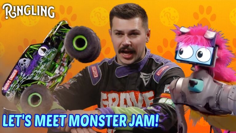 Grave Digger Monster Jam driver playing with Monster Jam toys with Bailey Circuit.